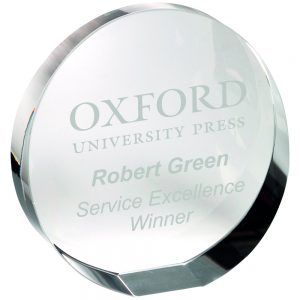 image showing round glass paperweight TD PAP4 with Oxford University Press logo engraved on white background
