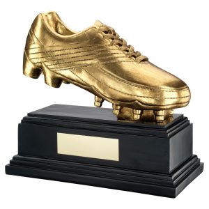 Image showing gold football boot on base football trophy against white background